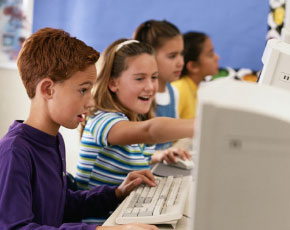 children working at computers